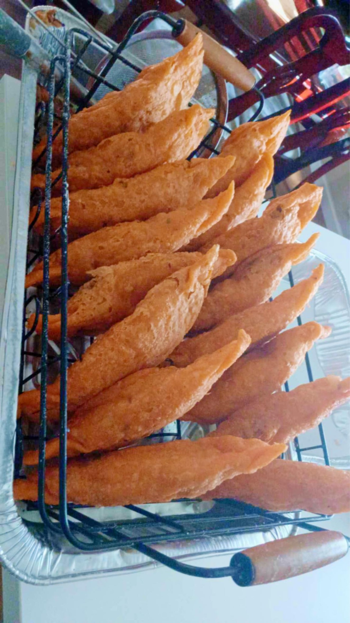 Empanadas in wire basket