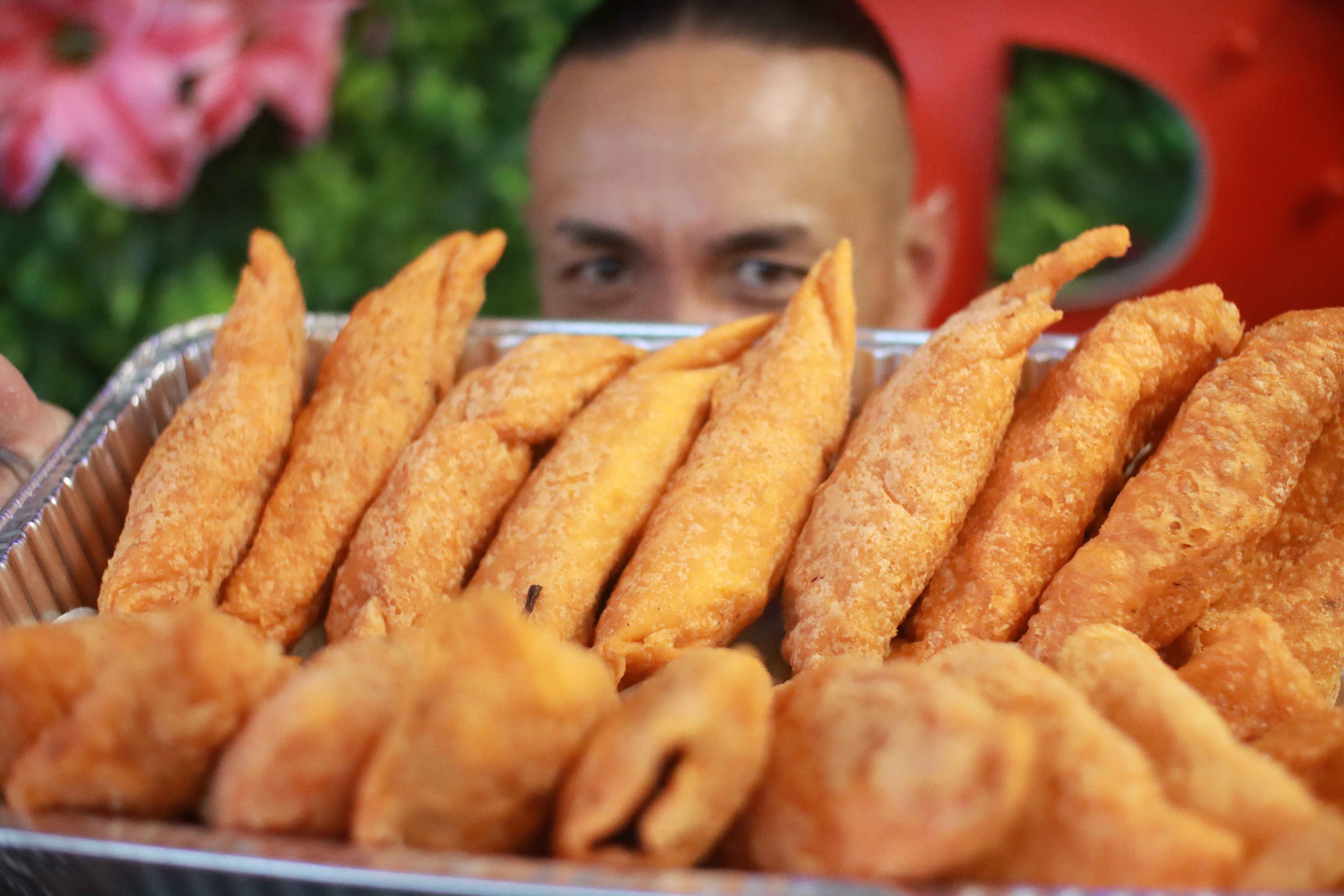 Large tray of freshly made empanadas